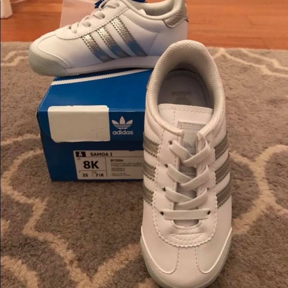 New in the box with tags , toddler size 8